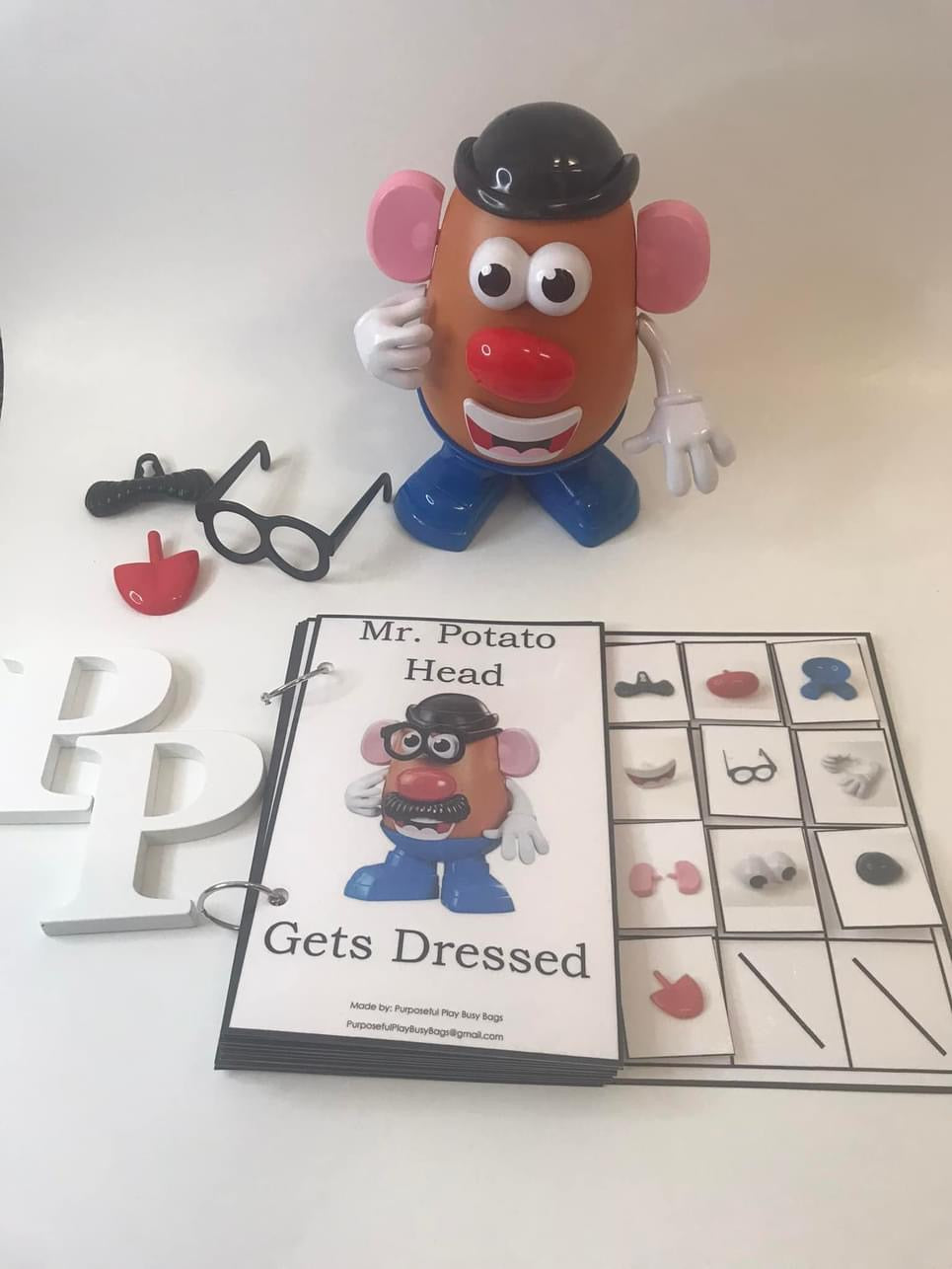 Mr. Potato Head Gets Dressed- Interactive Book
